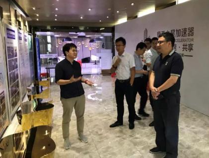 江西赣江新区一行领导到28圈加速器考察调研